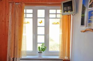 TV a/nebo společenská místnost v ubytování Guesthouse Leiputrija