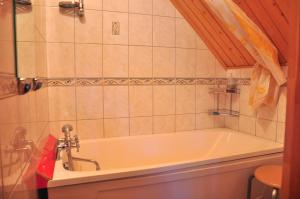 Koupelna v ubytování Guesthouse Leiputrija