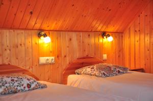 Postel nebo postele na pokoji v ubytování Guesthouse Leiputrija