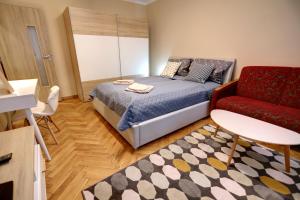 Posteľ alebo postele v izbe v ubytovaní Old Town Apartment