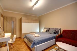 Posteľ alebo postele v izbe v ubytovaní Old Town Apartment