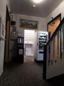 a hallway with a refrigerator in a room at Hostel31 in Tallinn