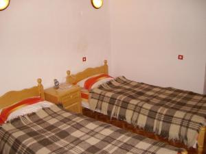 
A bed or beds in a room at Holiday Home Dima
