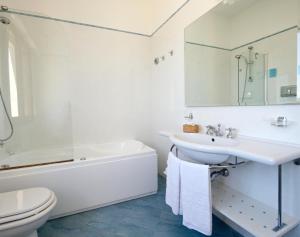 Koupelna v ubytování Hotel Punta Nord Est