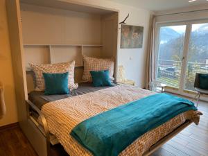 Una cama o camas en una habitación de FeWo Gretchen