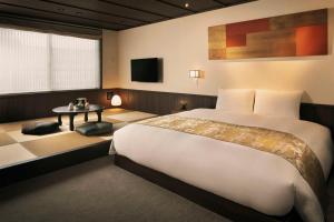 Cama o camas de una habitación en THE JUNEI HOTEL Kyoto Imperial Palace West