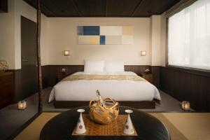 Cama o camas de una habitación en THE JUNEI HOTEL Kyoto Imperial Palace West