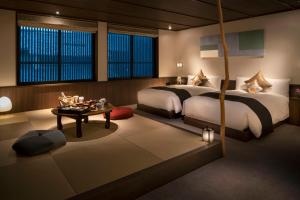 Cama o camas de una habitación en THE JUNEI HOTEL Kyoto Imperial Palace West