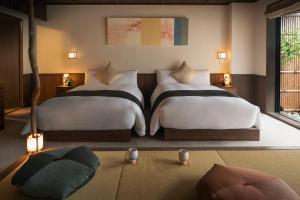 Cama o camas de una habitación en THE JUNEI HOTEL Kyoto Imperial Palace West