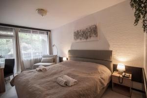 Krevet ili kreveti u jedinici u okviru objekta Hotel Faraon