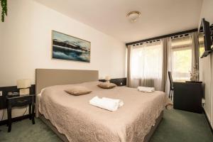 Krevet ili kreveti u jedinici u okviru objekta Hotel Faraon