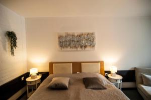 Krevet ili kreveti u jedinici u okviru objekta Hotel Faraon