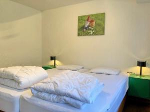 Postel nebo postele na pokoji v ubytování Moulin de Nawes