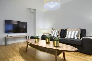 Telewizja i/lub zestaw kina domowego w obiekcie La Casa Gris