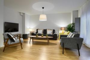 TV a/nebo společenská místnost v ubytování La Casa Gris