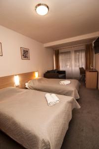 Krevet ili kreveti u jedinici u okviru objekta Hotel Faraon