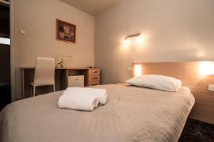 Krevet ili kreveti u jedinici u okviru objekta Hotel Faraon