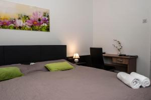 Krevet ili kreveti u jedinici u okviru objekta Hotel Faraon