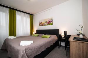 Krevet ili kreveti u jedinici u okviru objekta Hotel Faraon