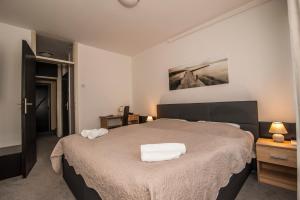 Krevet ili kreveti u jedinici u okviru objekta Hotel Faraon