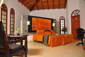 Ruang duduk di Ayubowan Swiss Lanka Bungalow Resort