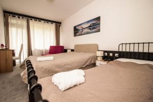 Krevet ili kreveti u jedinici u okviru objekta Hotel Faraon