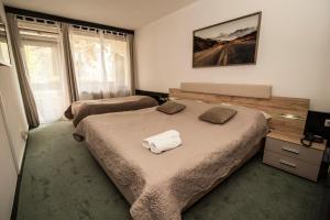 Krevet ili kreveti u jedinici u okviru objekta Hotel Faraon