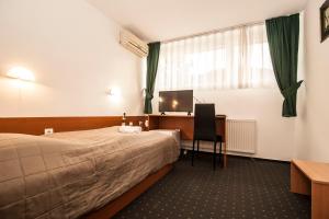 Krevet ili kreveti u jedinici u okviru objekta Hotel Faraon