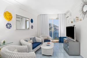 Гостиная зона в Positano Luxury Villas
