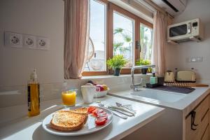 Kuchyň nebo kuchyňský kout v ubytování Moona Hostal Altea