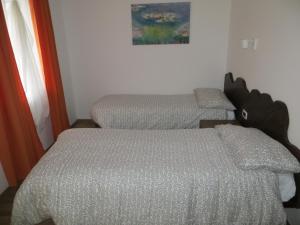 Postel nebo postele na pokoji v ubytování Agriturismo G.GARTROZ