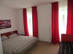 Postel nebo postele na pokoji v ubytování Agriturismo G.GARTROZ