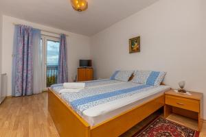 Posteľ alebo postele v izbe v ubytovaní Vacattio apartments