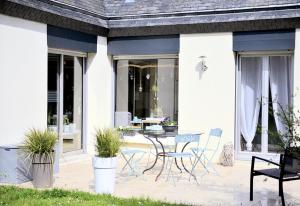Patio nebo venkovní prostory v ubytování Ailes et Iles