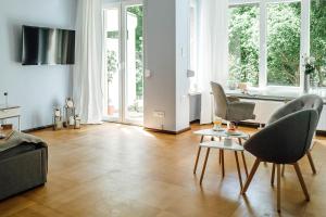 TV a/nebo společenská místnost v ubytování Doppelzimmer an der TA (Nr. 1)