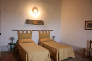 Postel nebo postele na pokoji v ubytování CASA ROSSA + 20 fotografií