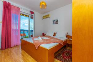 Postel nebo postele na pokoji v ubytování Vacattio apartment 2
