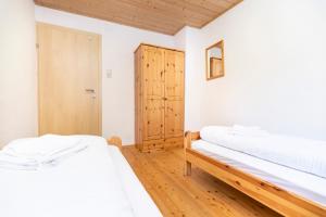 Postel nebo postele na pokoji v ubytování Chalet Struber