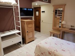 Cama o camas de una habitación en Hotel Alda A Boira