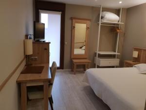 Cama o camas de una habitación en Hotel Alda A Boira