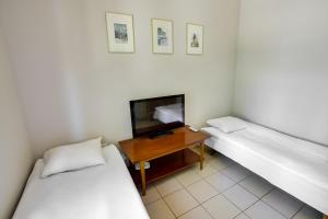 Een bed of bedden in een kamer bij Riga Academic Guest House