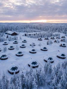 an aerial view of a resort in the snow at Northern Lights Village Levi in Levi