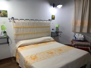 Postel nebo postele na pokoji v ubytování Antica Potecarìa