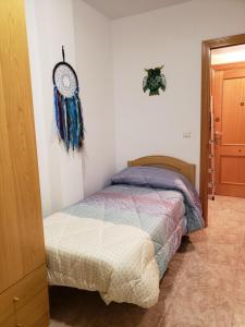 A bed or beds in a room at Can Joan