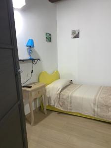 Postel nebo postele na pokoji v ubytování Antica Potecarìa