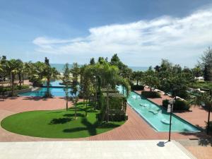an aerial view of a pool at a resort at TimurBay Residence by Onehomes in Kuantan