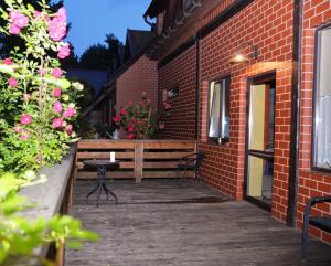 Patio nebo venkovní prostory v ubytování Apartament Poddąbie