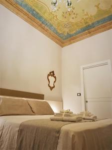 Postel nebo postele na pokoji v ubytování Il Sogno Torino Guesthouse