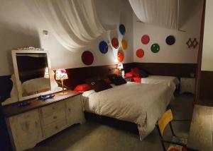 Postel nebo postele na pokoji v ubytování Barrio Boutik Hostal long stays