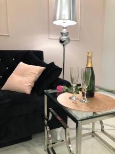 Nápoje v ubytovaní Apartament Luksusowy z sauną + 16 fotografií